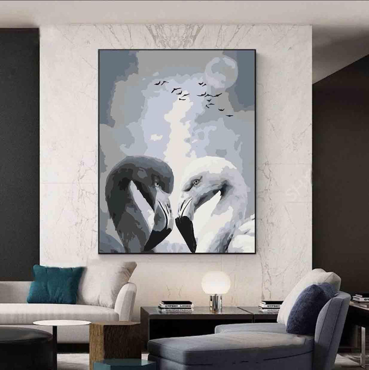 a living room with a couch and a painting on the wall