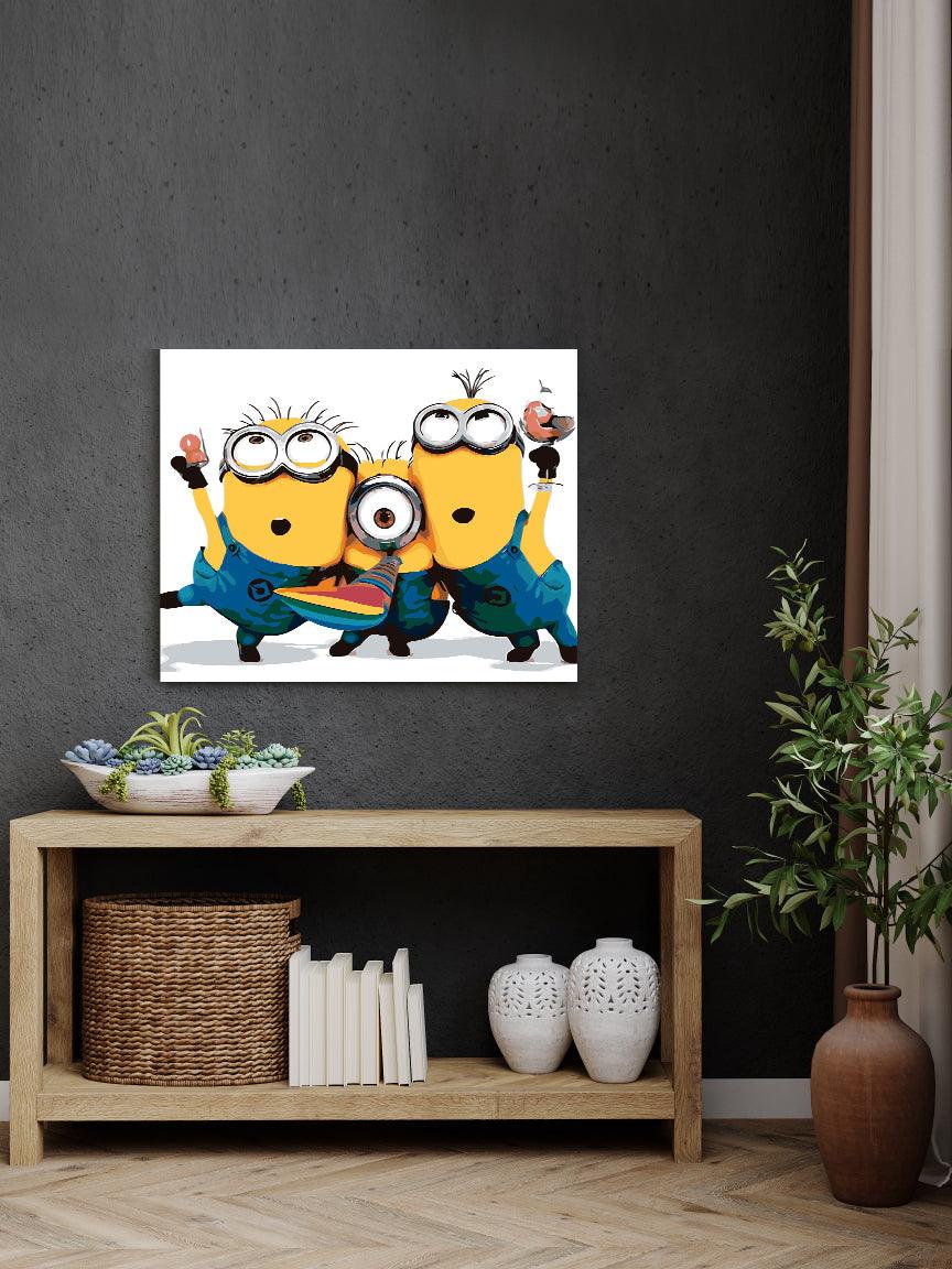 a picture of a couple of minion cartoon characters hanging on a wall